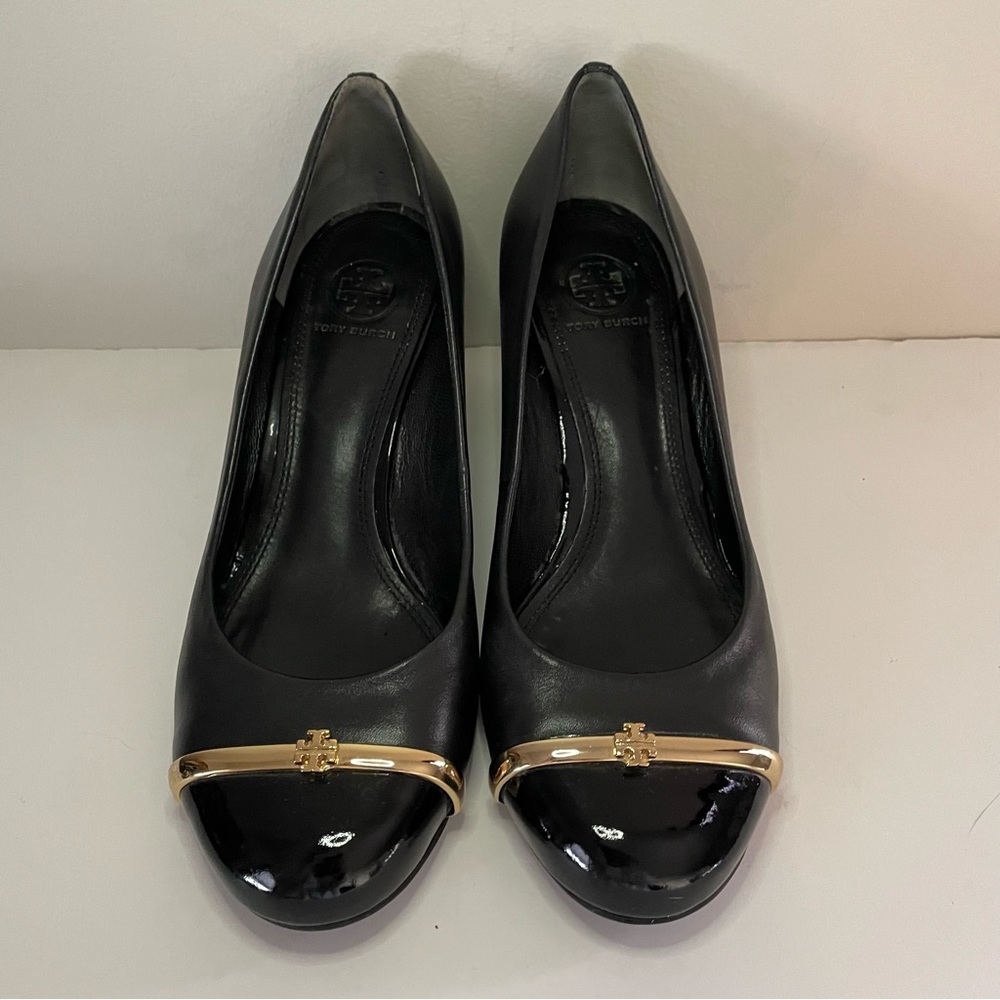 Tory Burch pacey black wedge heel pumps with gold bar. Sz 7